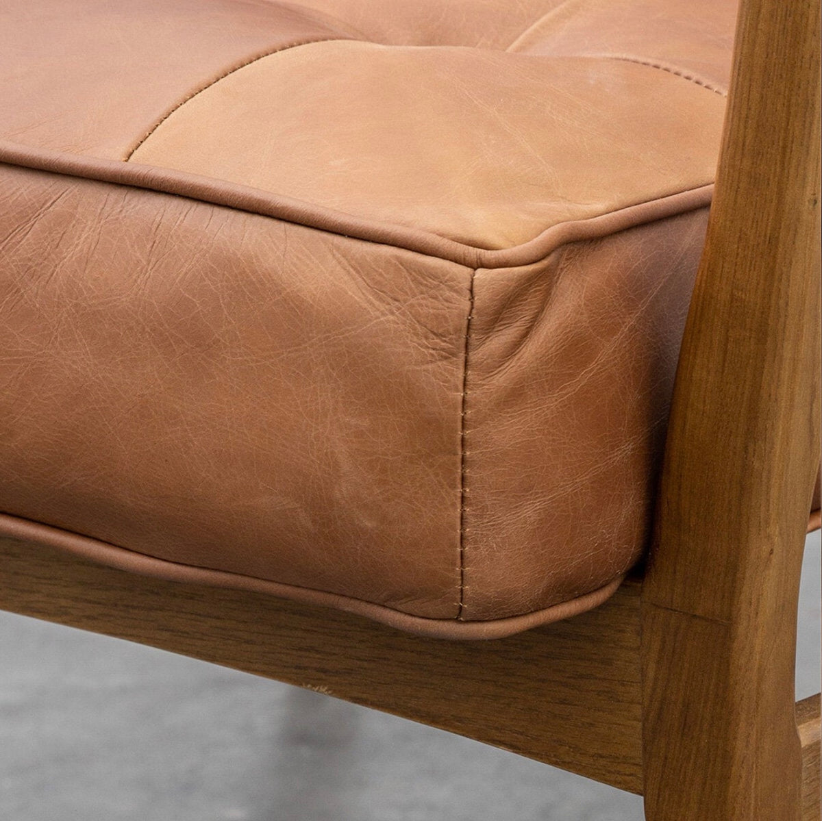 Gallery Humber Leather Armchair curved wooden armrest detail